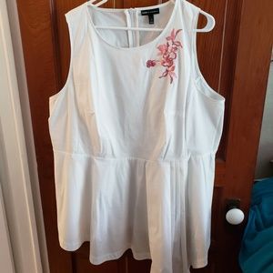White asymmetrical sleeveless top